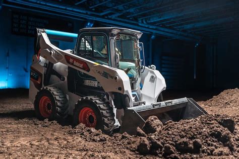 how much can a bobcat skid steer lift|machine bobcat price guide.